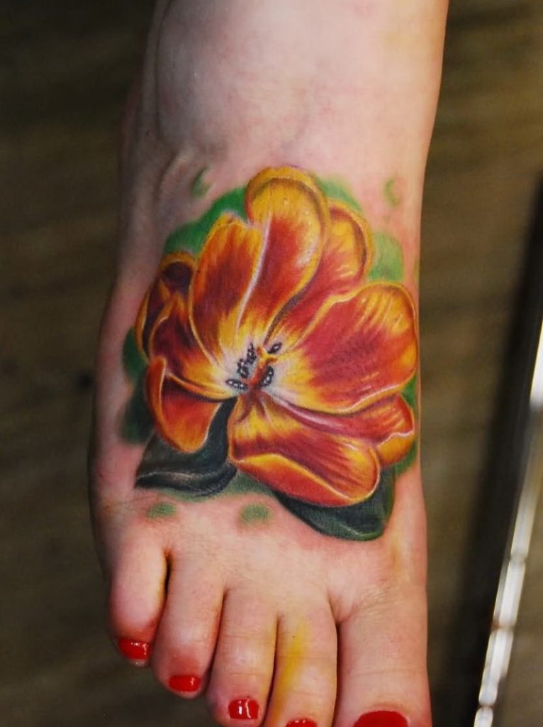 Wonderful_open_orange_tulip_flower_tattoo_on_foot
