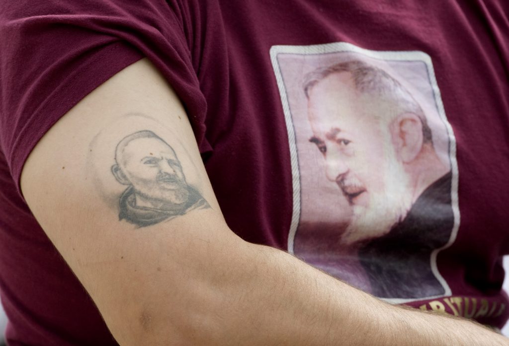 A tattoo of St. Padre Pio is seen on a man's arm as Pope Benedict XVI celebrates Mass outside the Church of St. Padre Pio of Pietrelcina in San Giovanni Rotondo, Italy, June 21. (CNS photo/Max Rossi, Reuters) (June 22, 2009) See POPE-PADREPIO June 22, 2009.