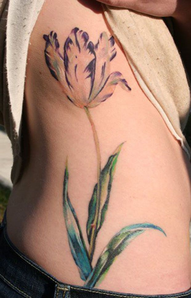 purple_tulip_flower_tattoo_on_ribs.jpg.pagespeed.ce.-rFtRaR3SF