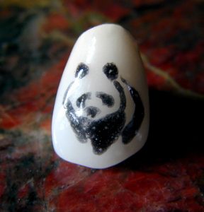 tatuaggio-sui-denti-corona-panda