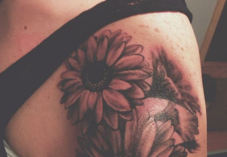 Tatuaggi fiori: la margherita. Significato e fotogallery